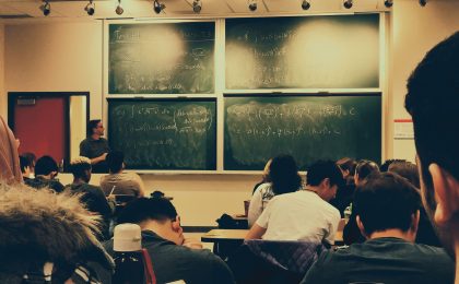 Wide view of students sitting in a classroom